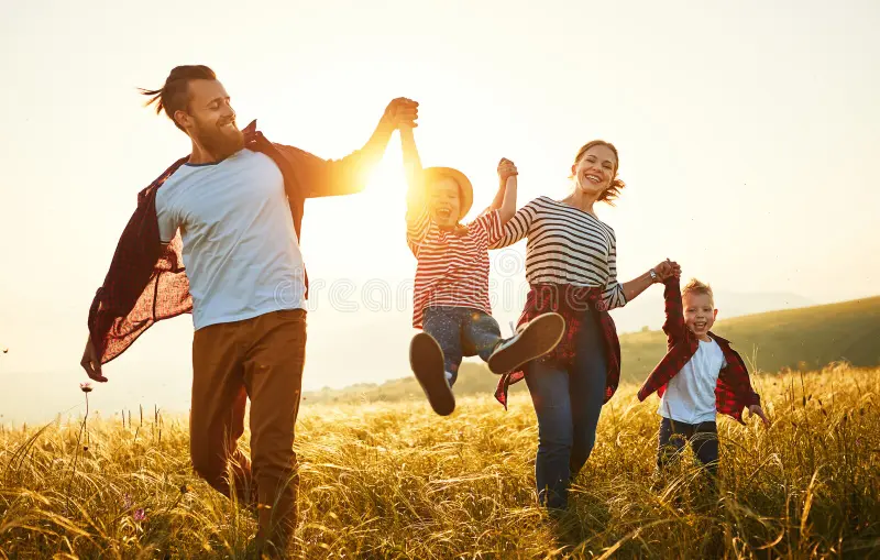 happy-family-mother-father-children-son-daughter-sunset-nature-150794881